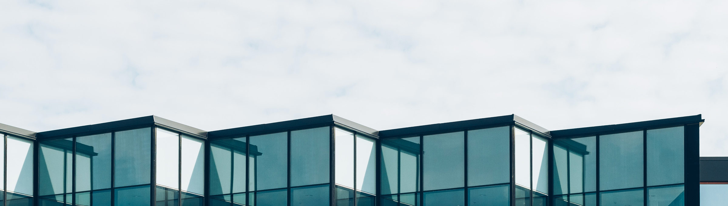 The glass facade of an office building.